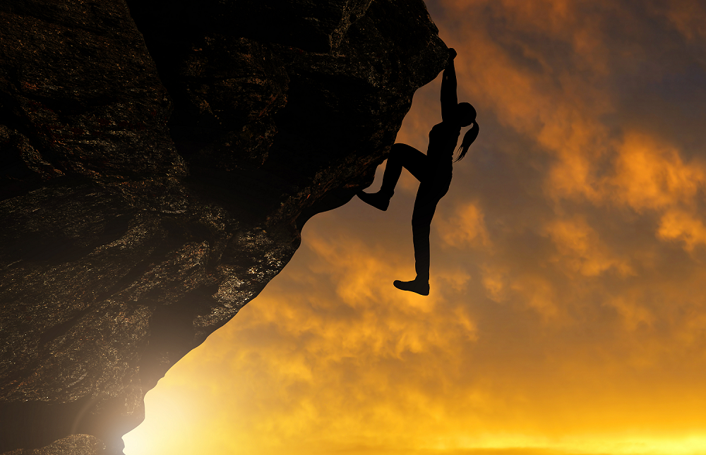 An image of a rock climber to symbolize the challenges of innovation