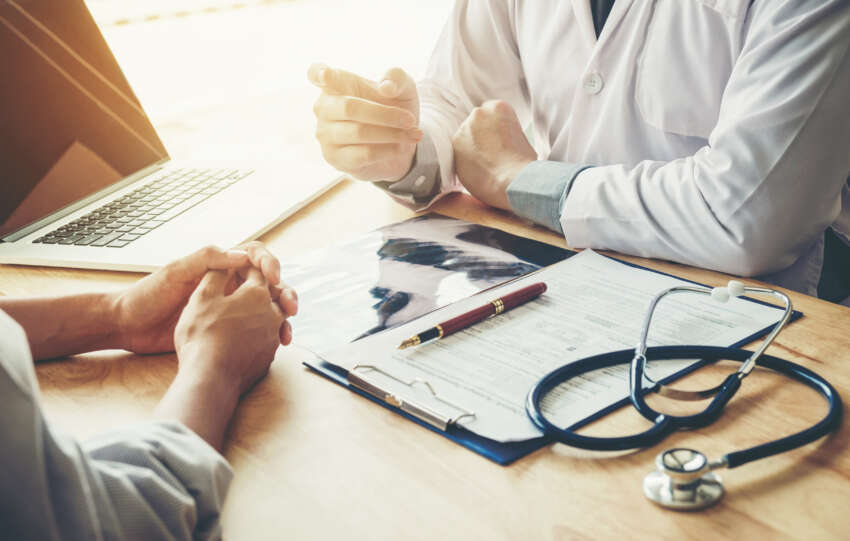 Image of Doctor and Patient talking